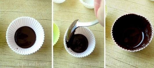 Covering cupcake liners with melted dark chocolate.