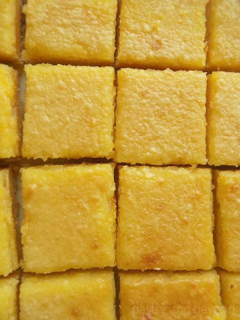 Lemon curd bars cut into 16 pieces.