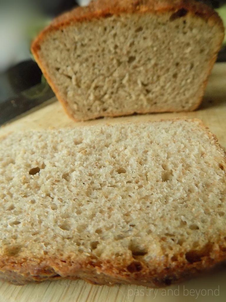 Whole wheat bread on a cutting board.