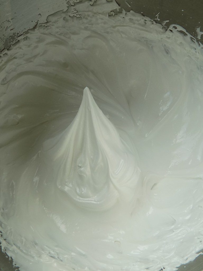 Swiss meringue in a mixing bowl.