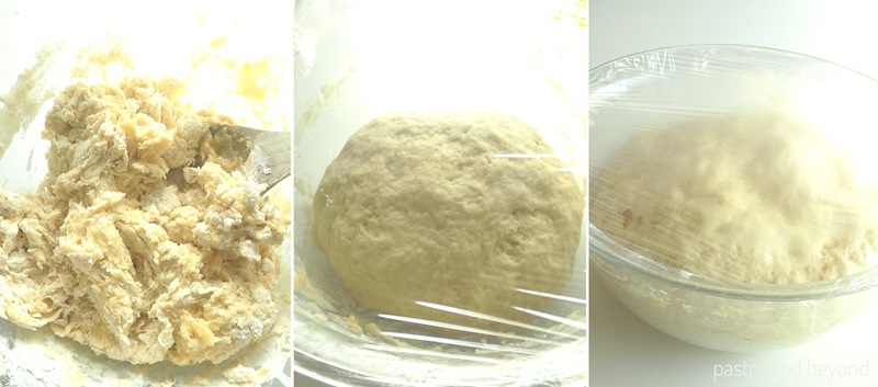 Soft dinner roll dough rise in a glass bowl covered with plastic film.