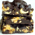 Stacked chocolate candy bark with nuts.