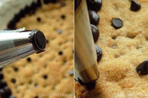 Decorating the cookie cake with a round tip.