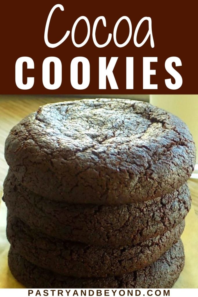 Stacked cocoa cookies with text overlay.
