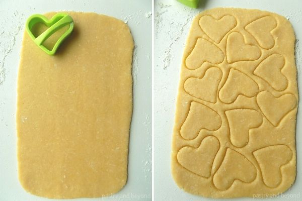 Rolling out the dough and cutting out with a heart cookie cutter.