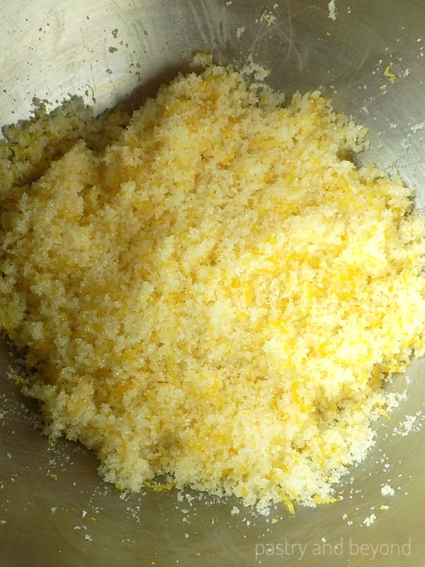 Lemon zest and sugar in a mixing bowl.