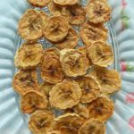 Oven dried bananas in a glass plate.