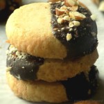 Stacked shortbread almond extract cookies.