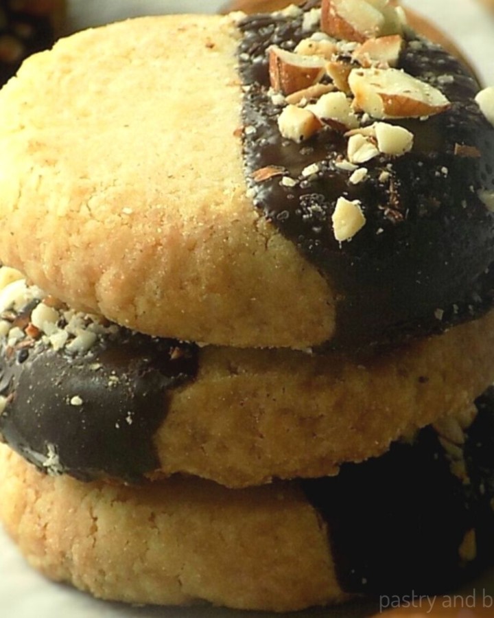 Stacked shortbread almond extract cookies.