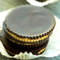Stacked dark chocolate peanut butter cups.
