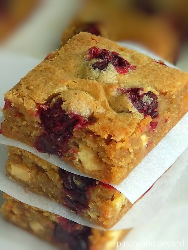 Stacked cranberry white chocolate blondies.