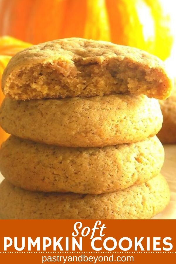 Stacked pumpkin Spice cookies with pumpkins in the background.