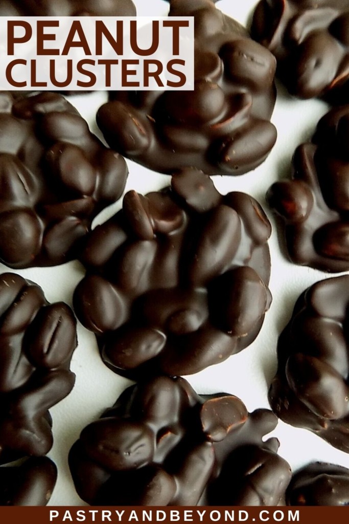Chocolate peanut clusters on a white surface with text overlay.