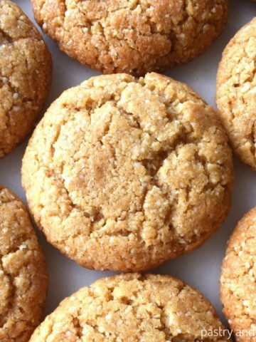 Almond flour peanut butter cookies on a white surface.
