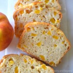 Slices of peach bread on a white surface.
