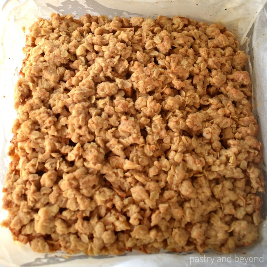 Apple oatmeal bars after baked in a dish.
