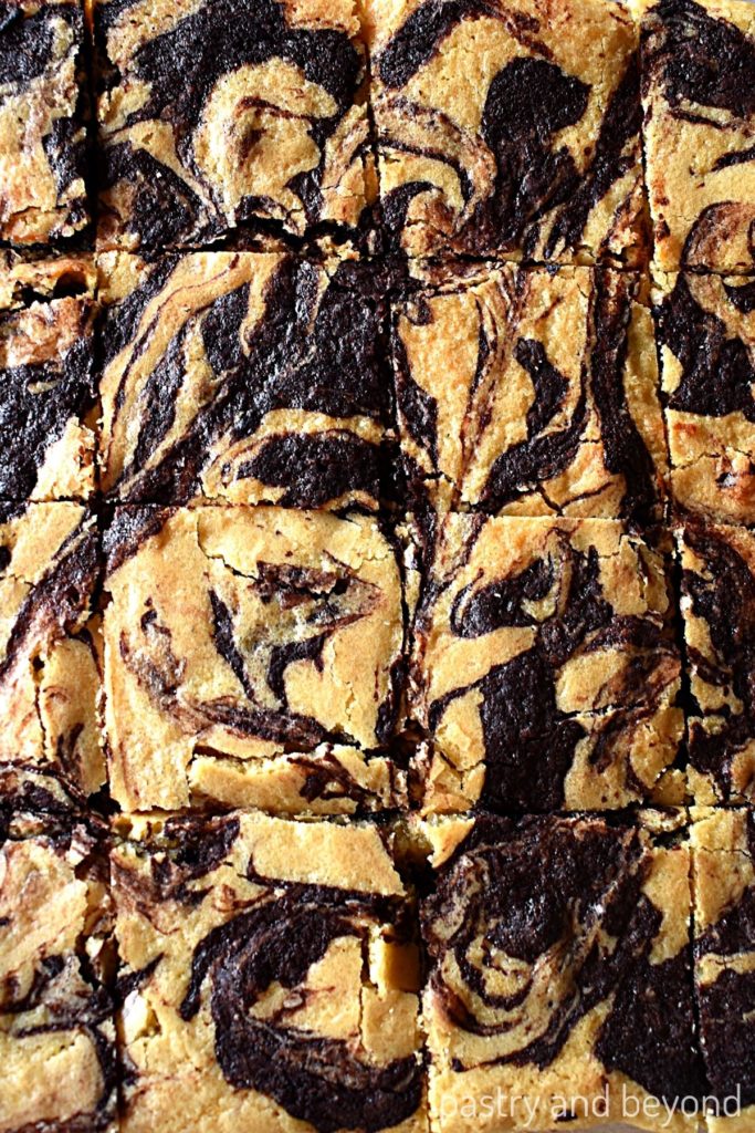Overhead view of brownie blondies with a swirl.