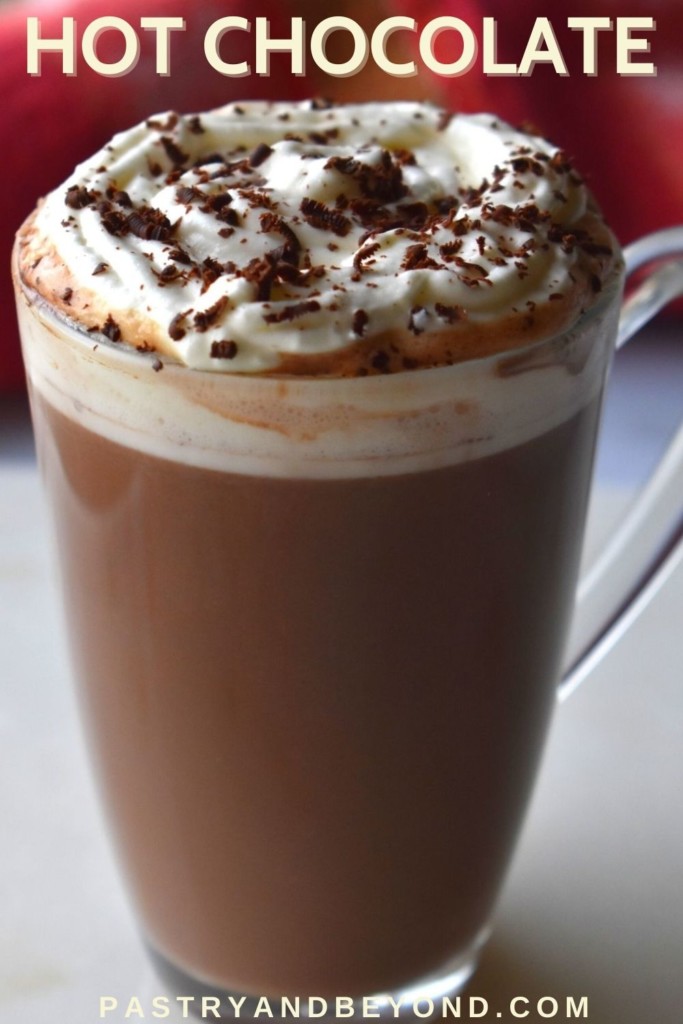 Hot chocolate in a glass with text overlay.