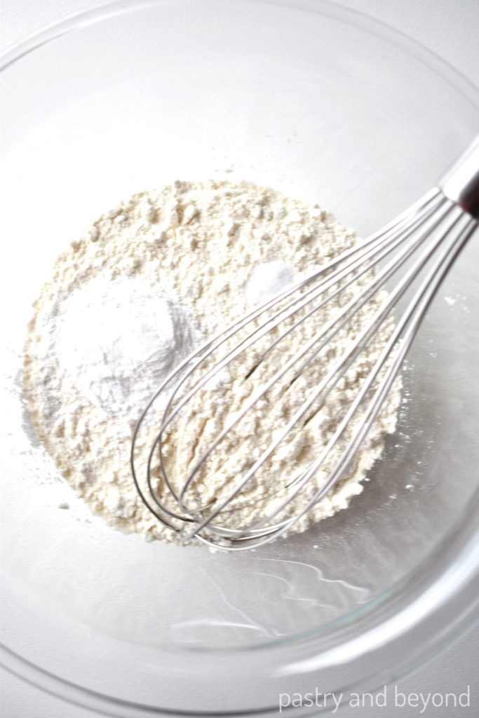 Flour, baking powder and salt in a medium glass bowl with a whisk.
