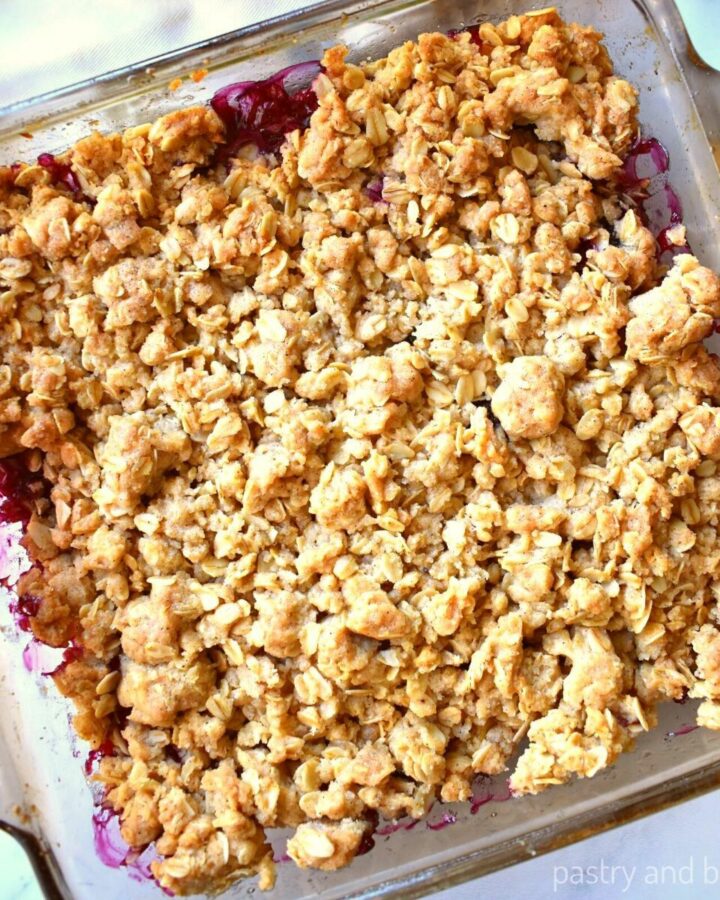 Apple and blueberry crumble in a baking dish.