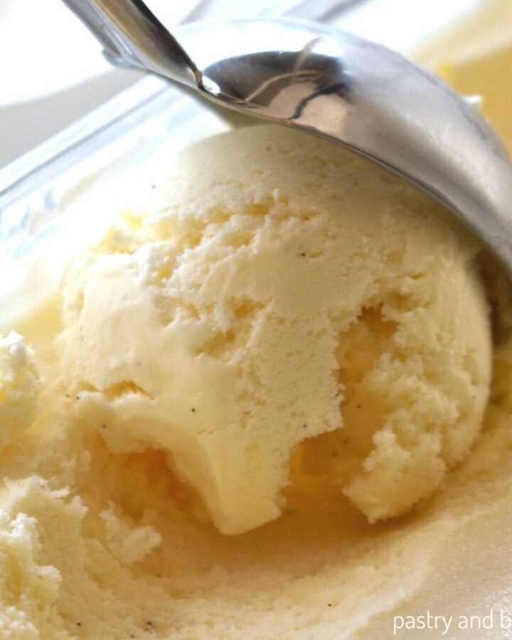 Scooping vanilla bean ice cream.