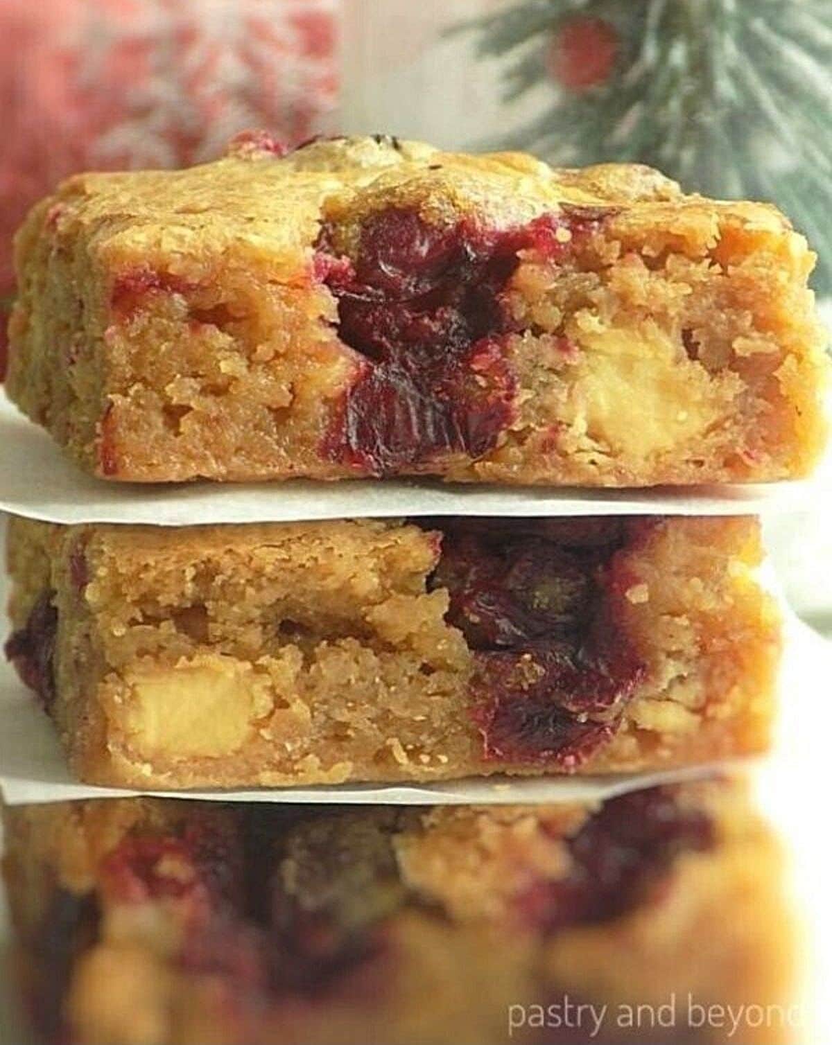 Stacked white chocolate cranberry blondies. 