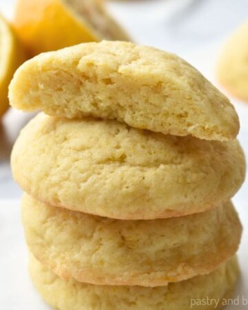 Stacked soft lemon cookies.